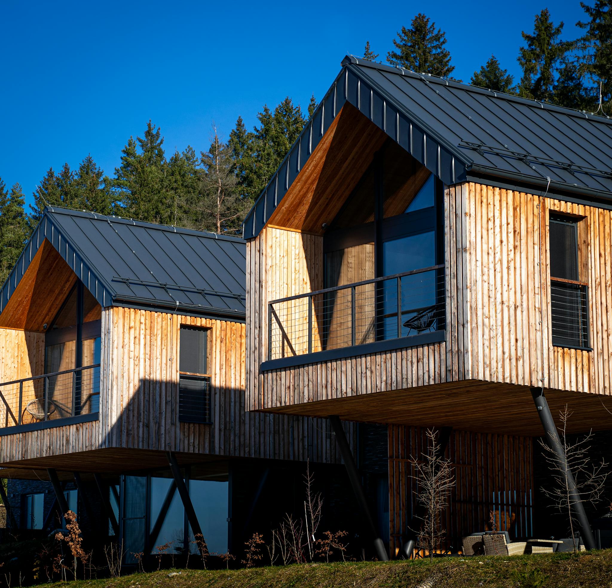 Modern Wooden Holiday Cottages by a Forest